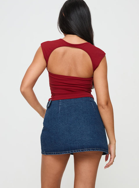 back view of model wearing Princess Polly Wait Up Denim Wrap Mini Skirt Mid Wash Mini Skirts Skirts 