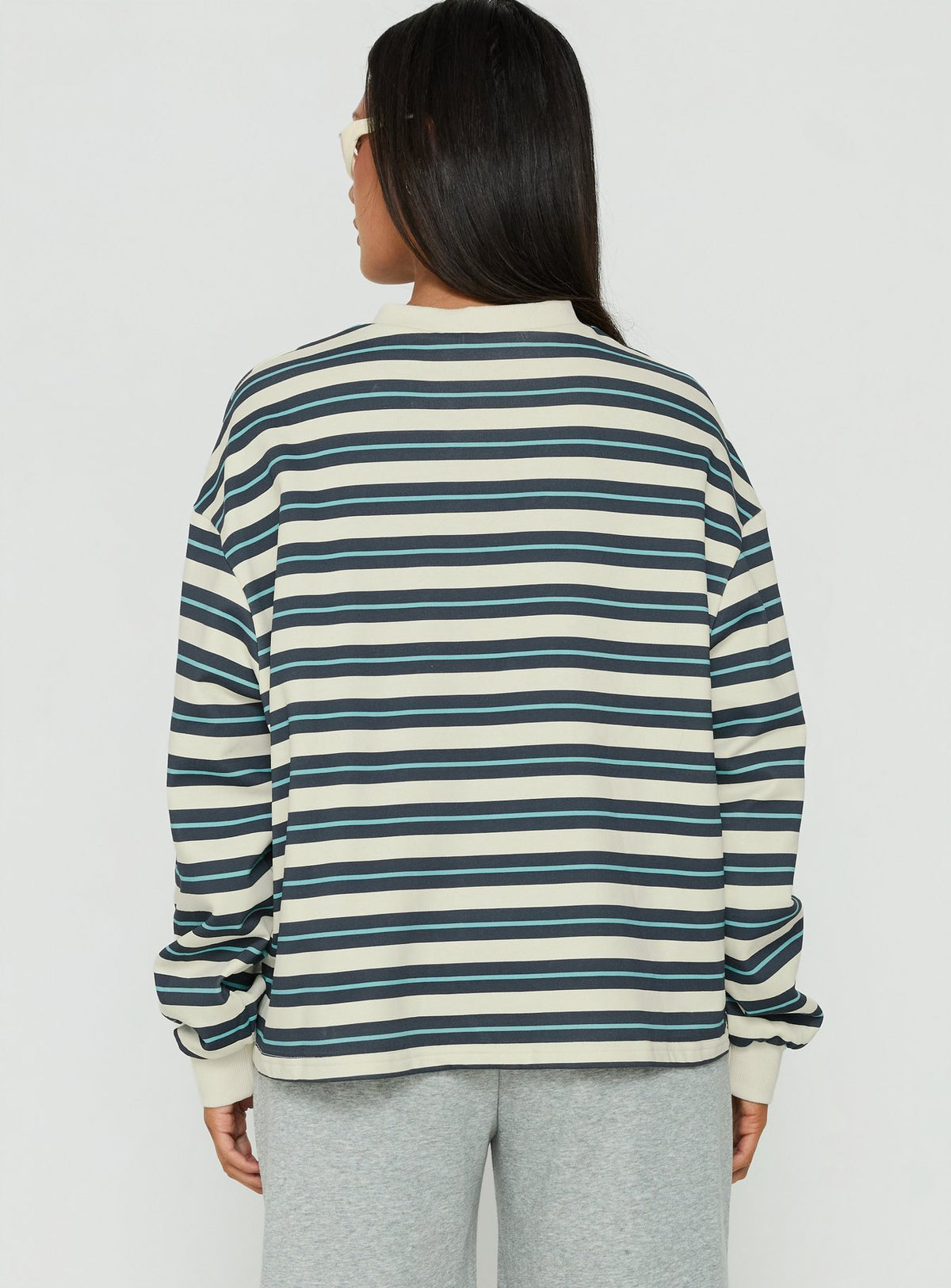 Presenting the Opollo V Neck Jumper Blue Multi Stripe womens-jumpers with short length back view of model wearing Princess Polly