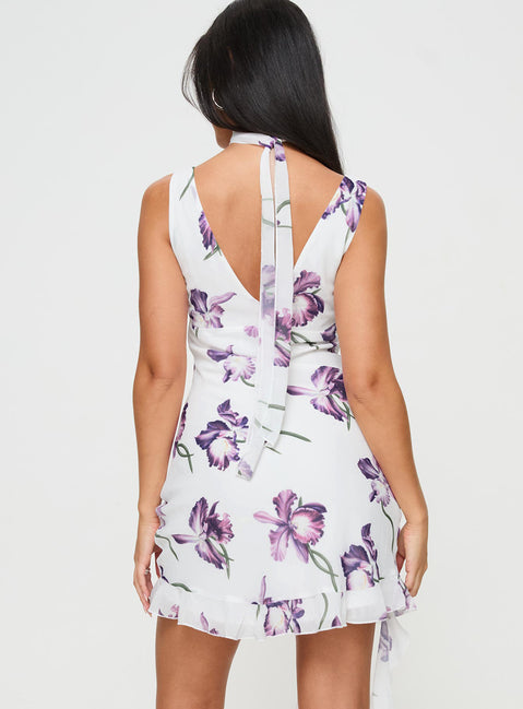 back view of model wearing Princess Polly Varney Frill Mini Dress White / Purple Floral Plunger 