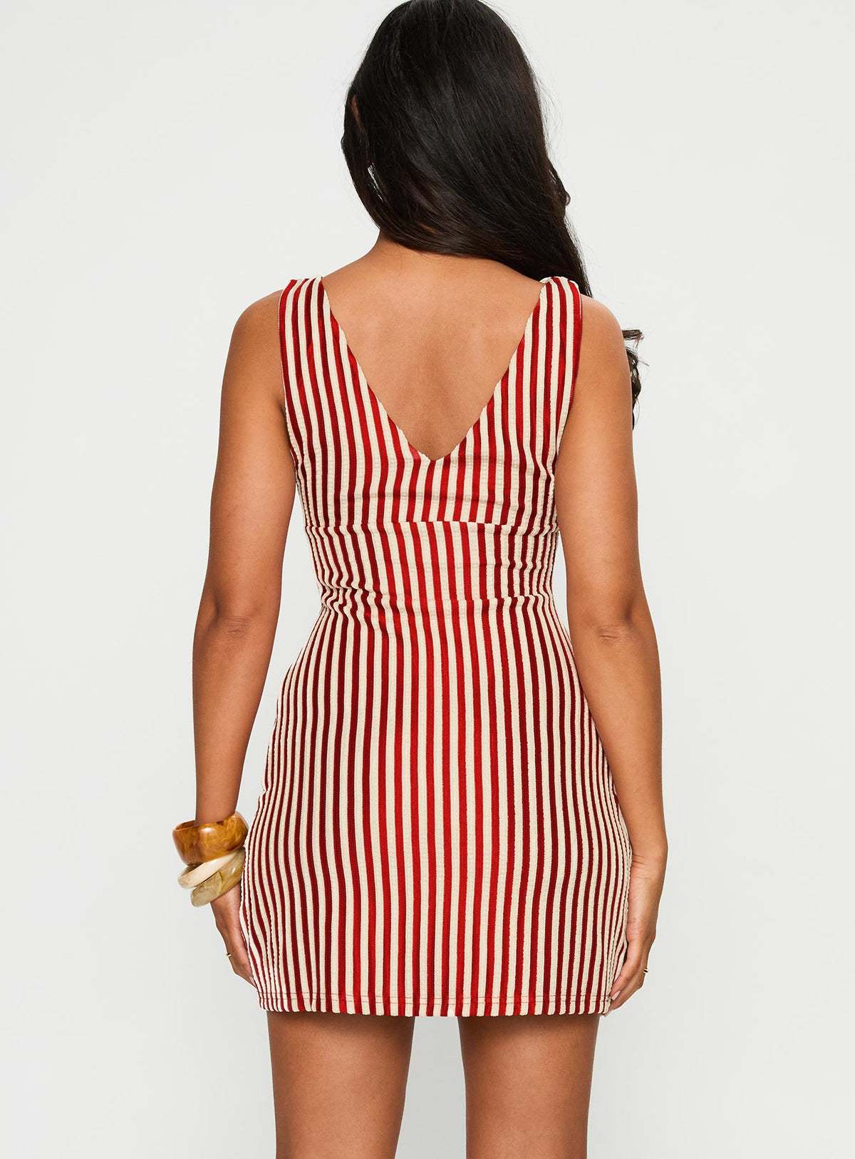 back view of model wearing Princess Polly Daphney Plunge Mini Dress Red / Cream Plunger 