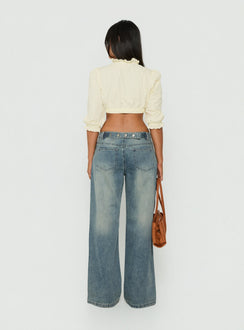 Crafted with the Karlos Low Rise Cinched Baggy Jeans Vintage Mid Blue Wash in womens-jeans featuring abstract print and belt back view of model wearing Princess Polly