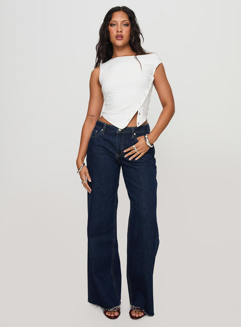 front view of model wearing Princess Polly Darla Low Rise Straight Jean Dark Wash Petite Low Rise Jeans 
