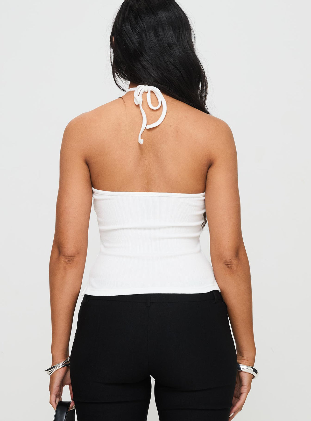 back view of model wearing Princess Polly Baseline Halter Rib Top White Sleeveless 