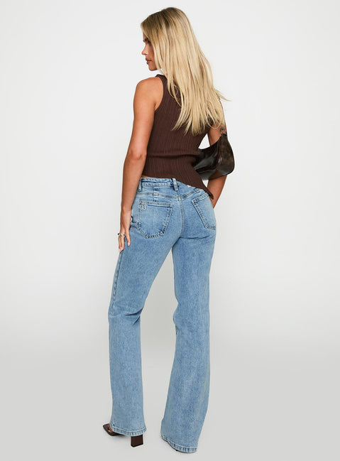 back view of model wearing Princess Polly Magic Mirror Mid Rise Bootleg Jeans Ice Wash Petite Mid Rise Jeans 