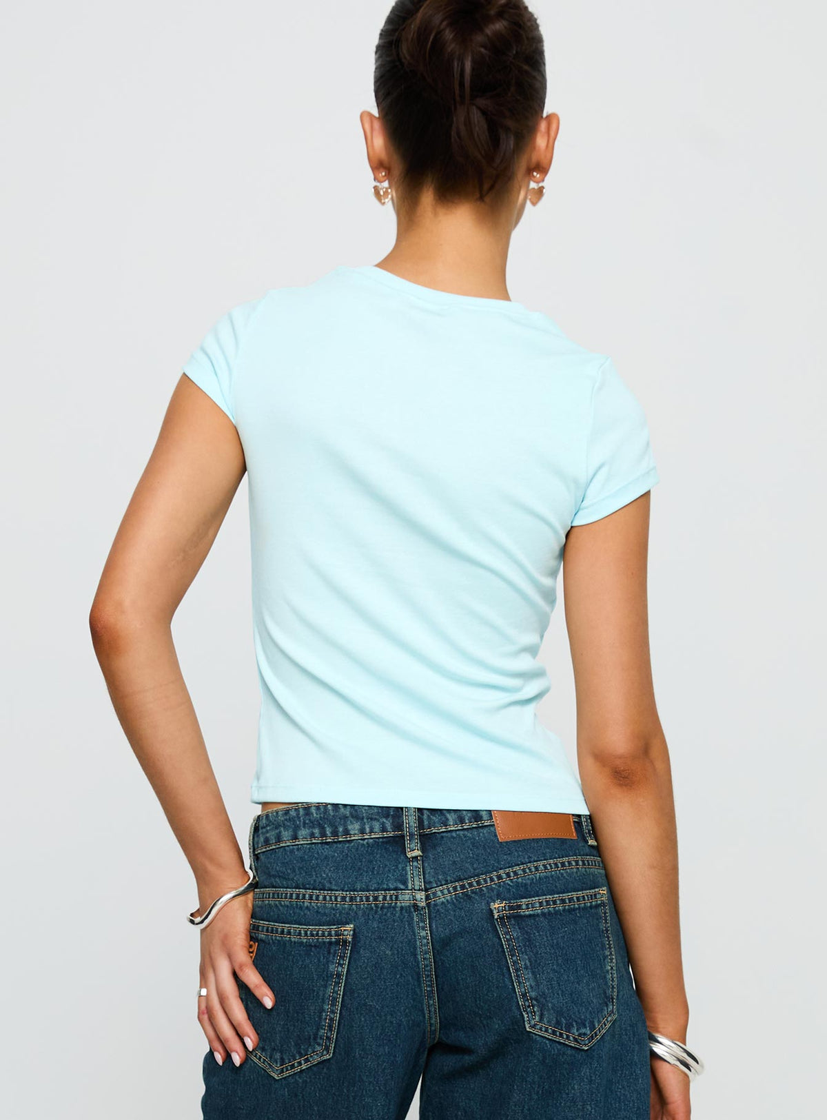 back view of model wearing Princess Polly Sweet Swans Baby Tee Blue Short Sleeves Crew Neck 