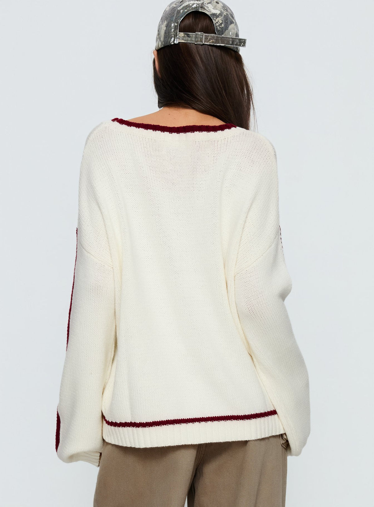 back view of model wearing Princess Polly Star Track Graphic Jumper Cream / Red Longline Jumpers Jumpers 