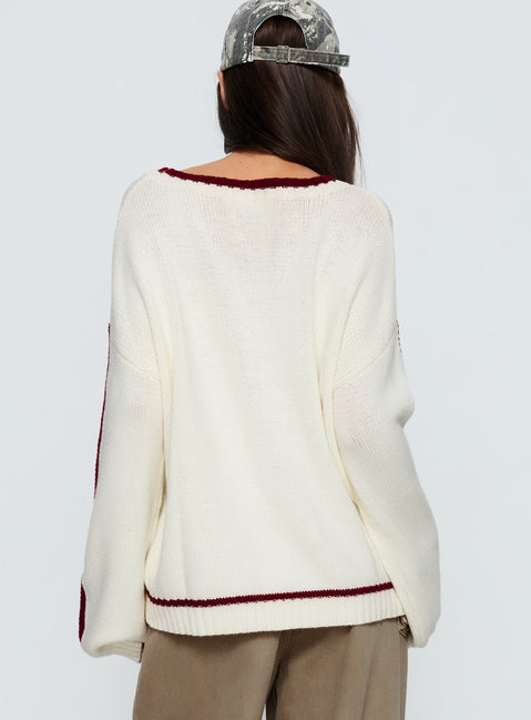 back view of model wearing Princess Polly Star Track Graphic Jumper Cream / Red Longline Jumpers Jumpers 