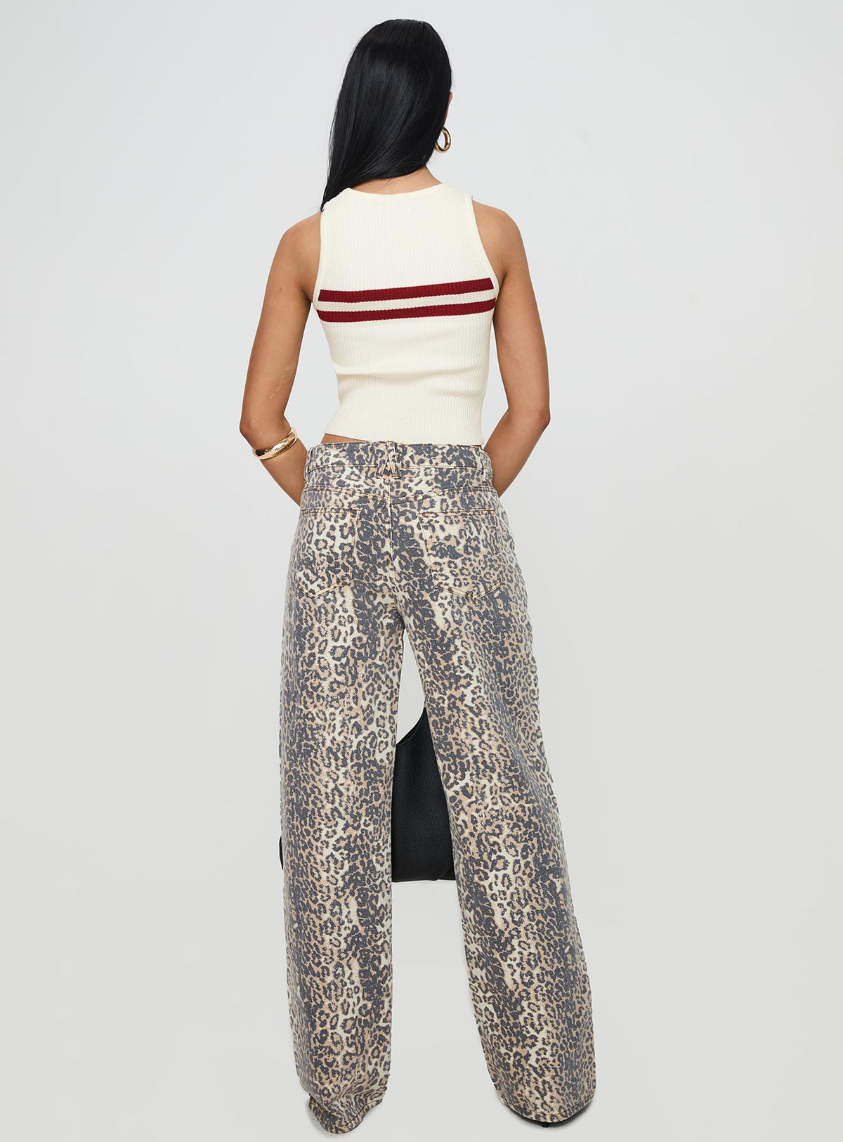 back view of model wearing Princess Polly Top Model Low Rise Straight Leg Jeans Leopard Fade Mid Rise Jeans Jeans 