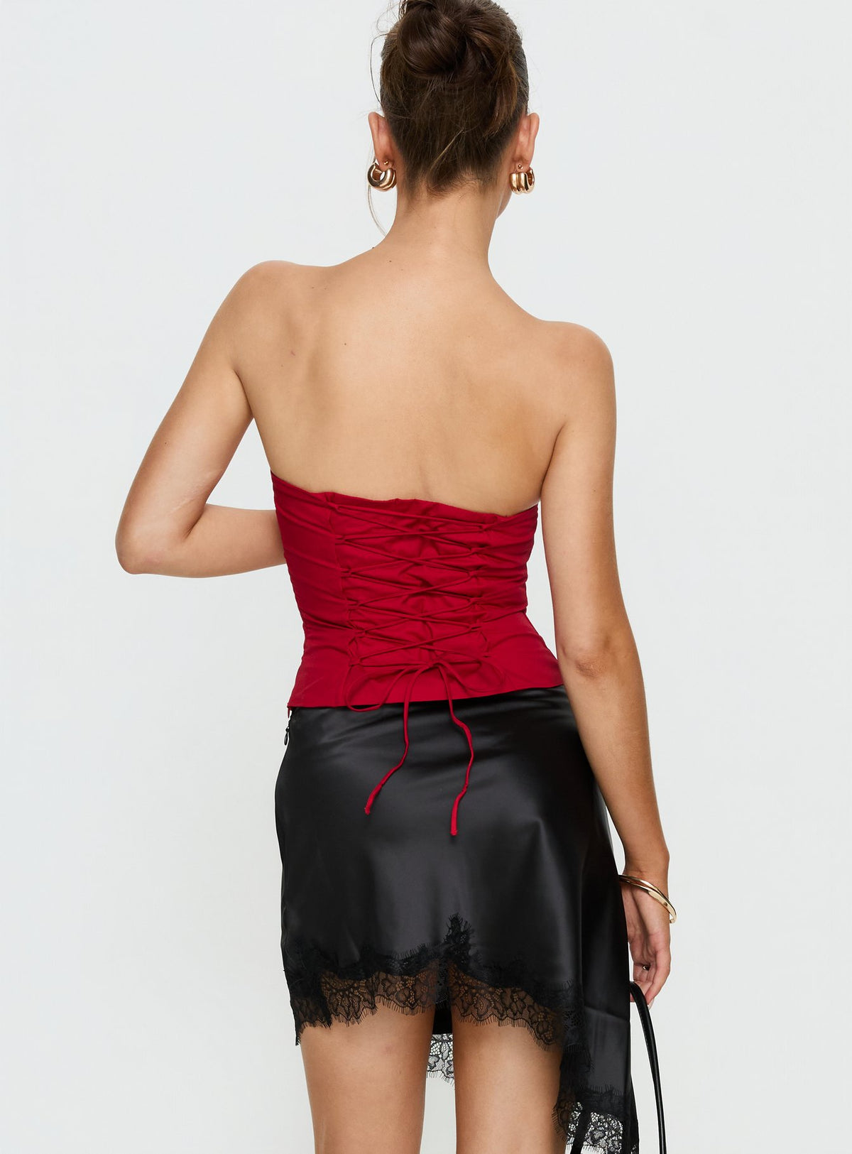 back view of model wearing Princess Polly Idette Lace Asymmetrical Mini Skirt Black Mini Skirts Skirts 