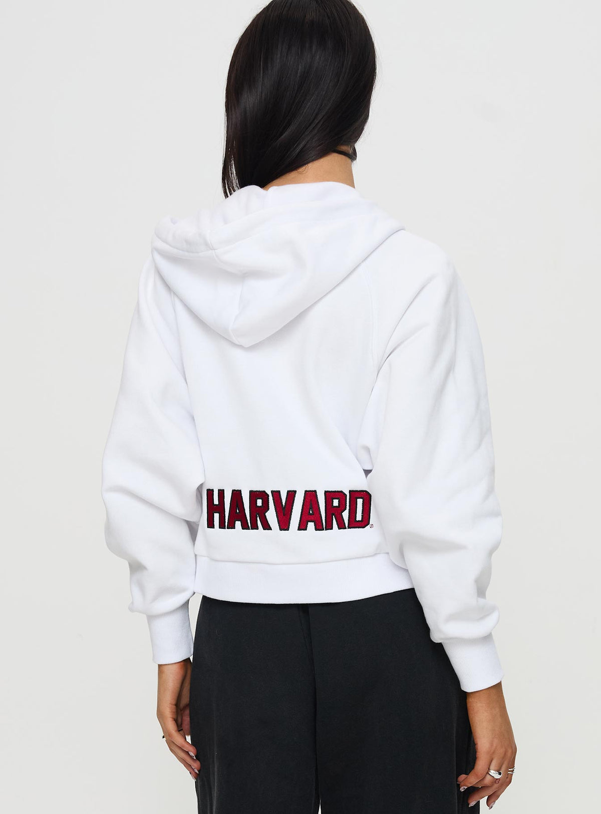 back view of model wearing Princess Polly Harvard Raglan Zip Up White / Red Jumpers 