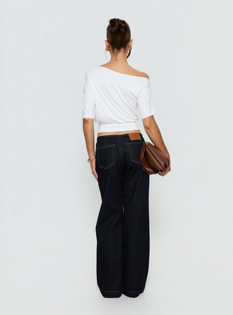 Highlighting Buenos No Waist Low Rise Straight Leg Jeans in Raw Denim womens-jeans featuring low-rise waist back view of model wearing