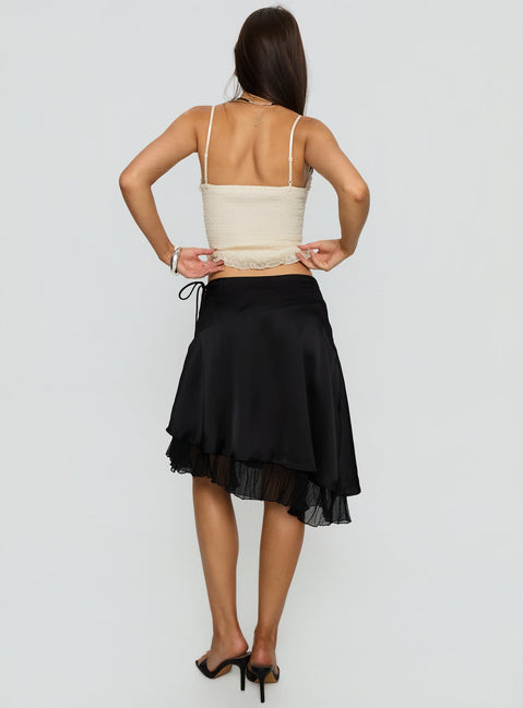 back view of model wearing Princess Polly Rosemead Satin Midi Skirt Black Midi Skirts Skirts 