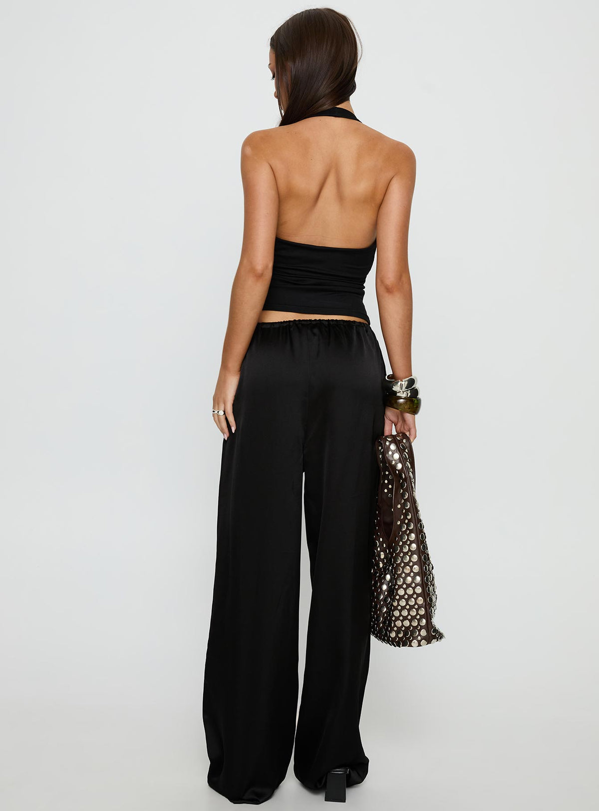 back view of model wearing Princess Polly Soulstar Satin Pants Black High Rise Pants Pants 