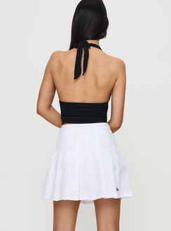back view of model wearing Princess Polly USC Tennis Skort White Skirts 