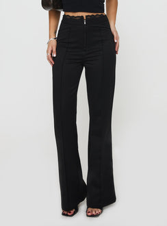 side view of model wearing Princess Polly Stellina Slim Fit Flared Pants Black High Waisted Pants 
