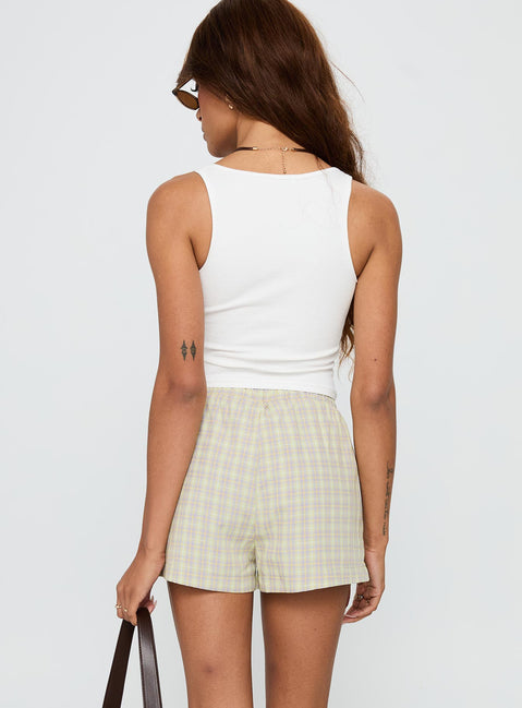 back view of model wearing Princess Polly Star Blaze Shorts Green Check High Waisted Shorts 
