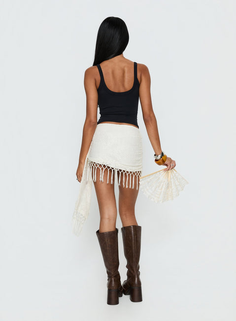 back view of model wearing Princess Polly Winita Macrame Tassel Mini Skirt Cream Mini Skirts Skirts 