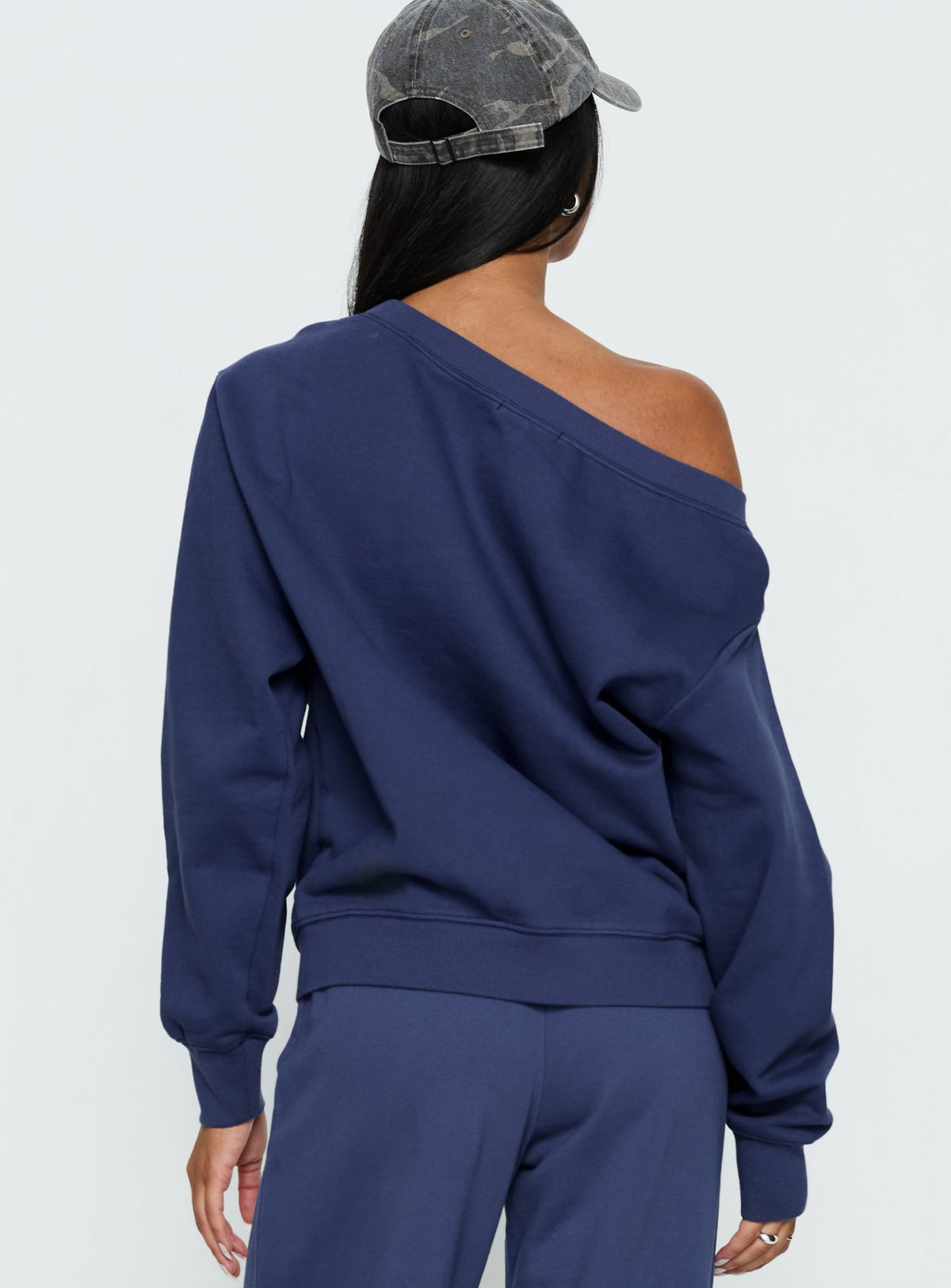 back view of model wearing Princess Polly Wellness Off the Shoulder Jumper Navy Jumpers 