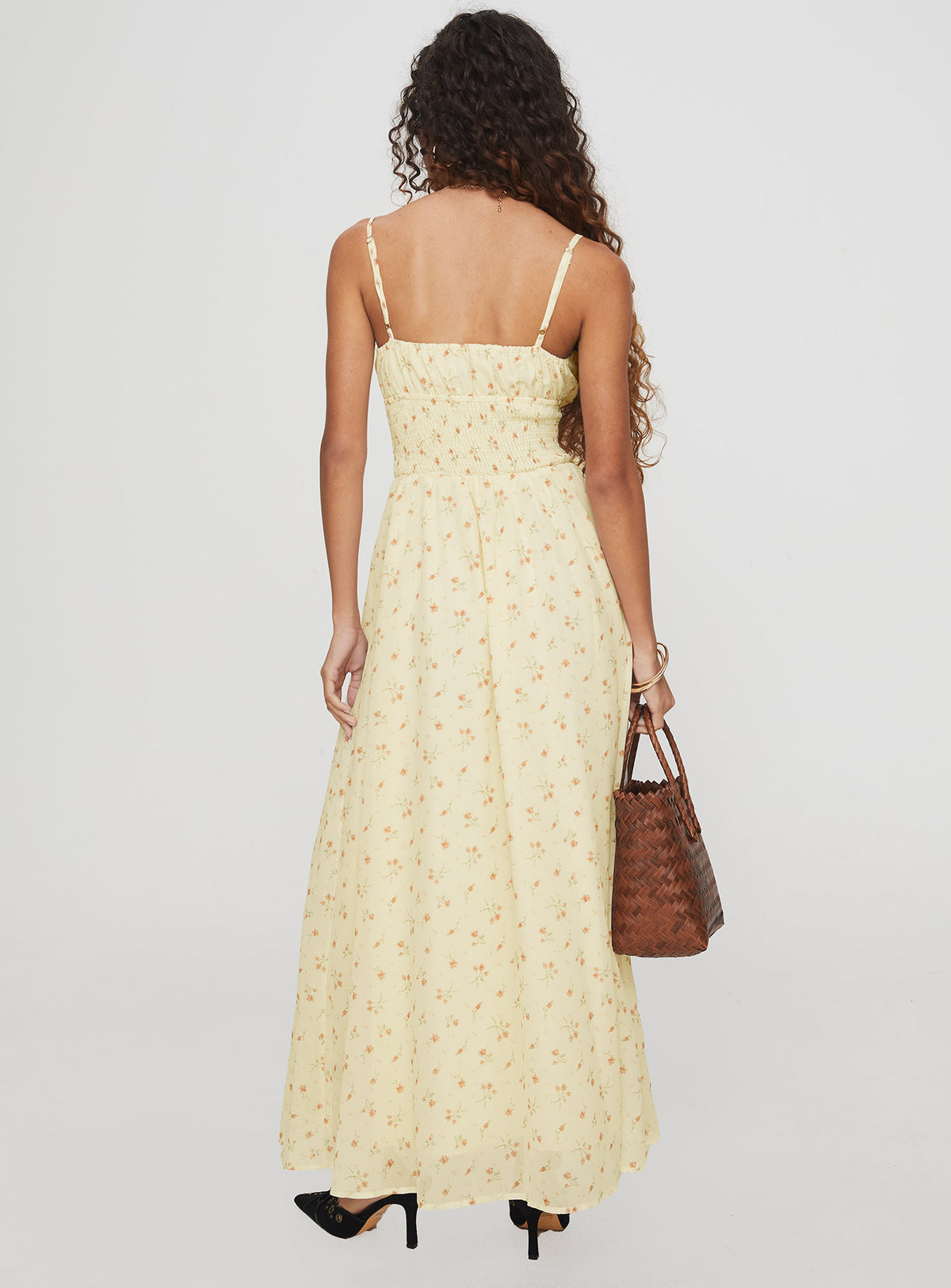 back view of model wearing Princess Polly Pearle Shirred Maxi Dress Cream Floral Square Neck 