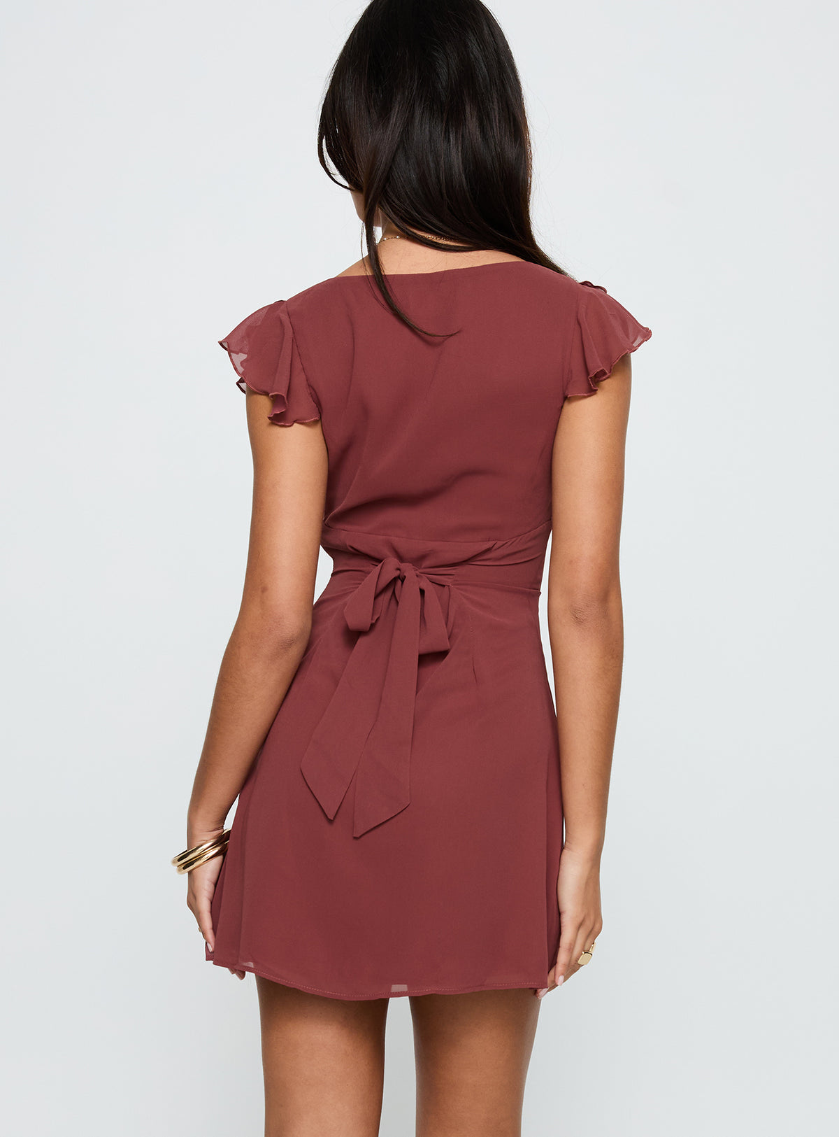 back view of model wearing Princess Polly I Guess So Mini Dress Currant Plunger 