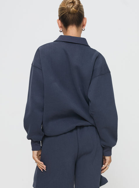 back view of model wearing Princess Polly Dream Fleece Quarter Zip Sweatshirt Navy Jumpers 