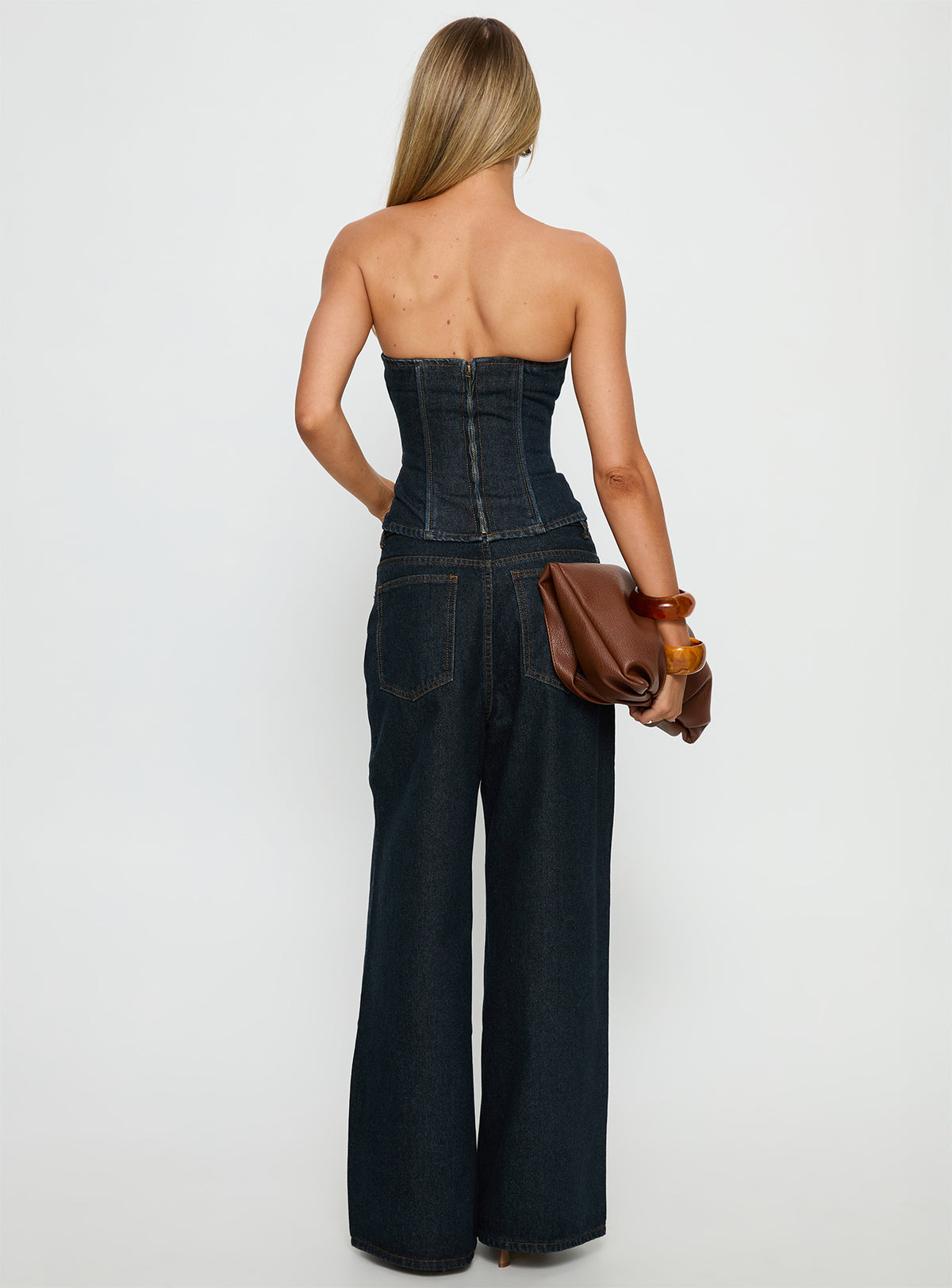 back view of model wearing Princess Polly Blue Crush Low Rise Wide Leg Jeans Indigo Mid Rise Jeans Jeans 