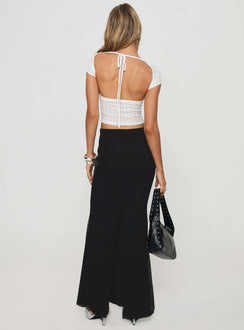 back view of model wearing Princess Polly Topping Maxi Skirt Black Maxi Skirts Skirts 