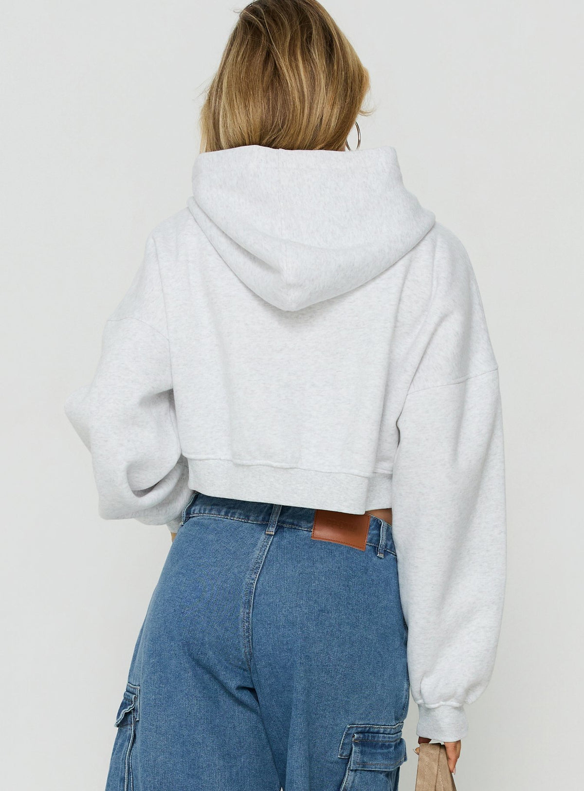 Designed with the Zellah Double Ended Zipper Hoodie Grey Marle womens-jumpers in short length back view of model wearing Princess Polly