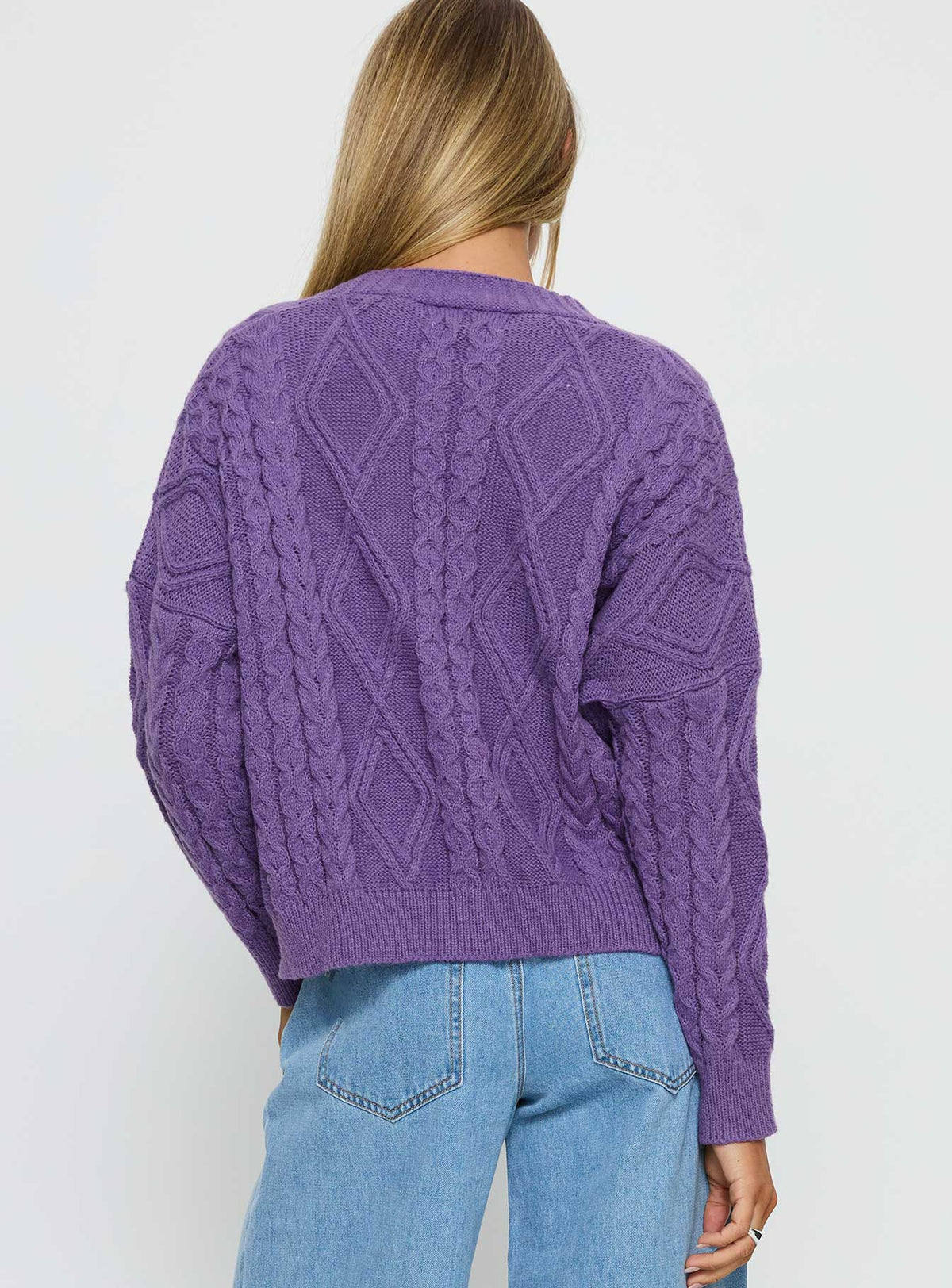 back view of model wearing Princess Polly Dillian Cable Knit Cardigan Purple Cropped Jumpers Jumpers 