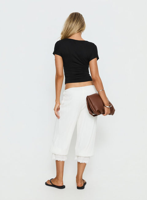 back view of model wearing Princess Polly Basma Bloomer Trouser Pants Rayon White Mid Rise Pants Pants 