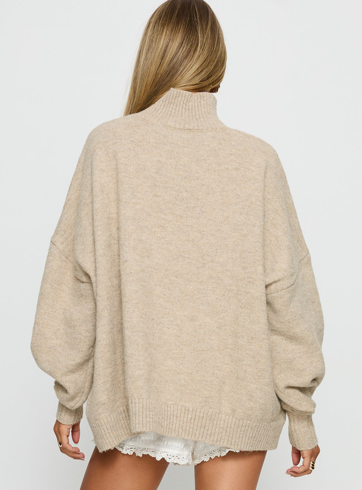 back view of model wearing Princess Polly Patrizia Funnel Neck Knit Sweater Beige Jumpers 