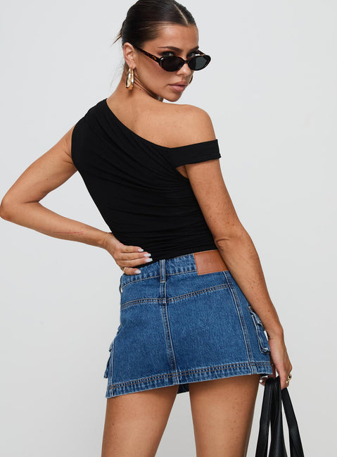back view of model wearing Princess Polly Pacific Coast Denim Cargo Skirt Dark Wash Mini Skirts Skirts 