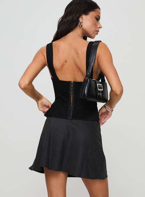 back view of model wearing Princess Polly Dapple Bias Mini Skirt Black Mini Skirts Skirts 