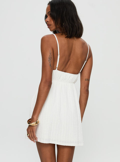 back view of model wearing Princess Polly All Too Well Mini Dress White V-Neck 