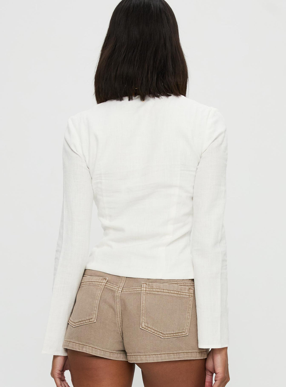 back view of model wearing Princess Polly Clouded Linen Long Sleeve Top White Full Sleeves Plunger 
