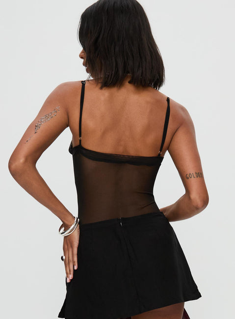 back view of model wearing Princess Polly In The Club Bodysuit Black Sleeveless Bodysuit 