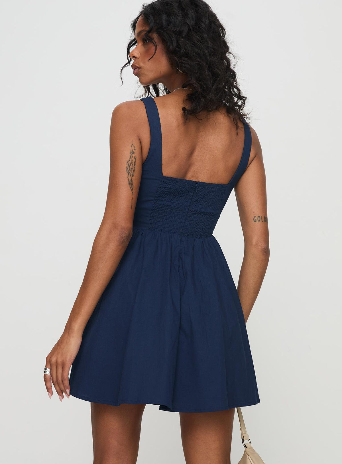 back view of model wearing Princess Polly Martie Mini Dress Navy Square Neck 