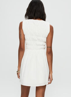back view of model wearing Princess Polly Melona Shirred Mini Dress White Boat Neck 