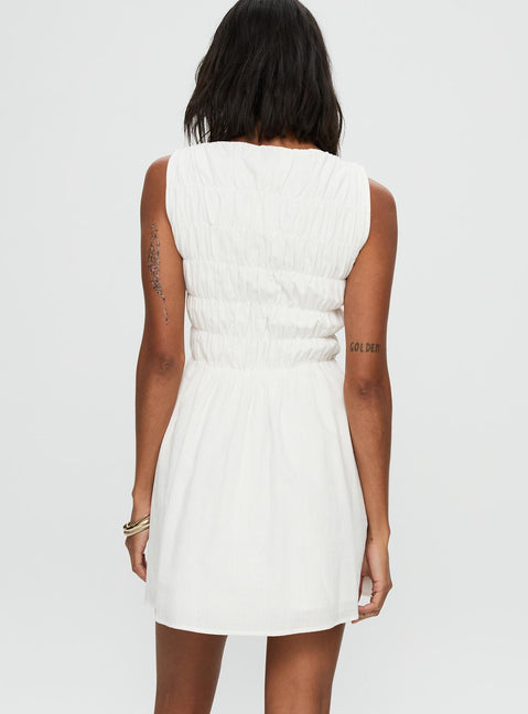 back view of model wearing Princess Polly Melona Shirred Mini Dress White Boat Neck 