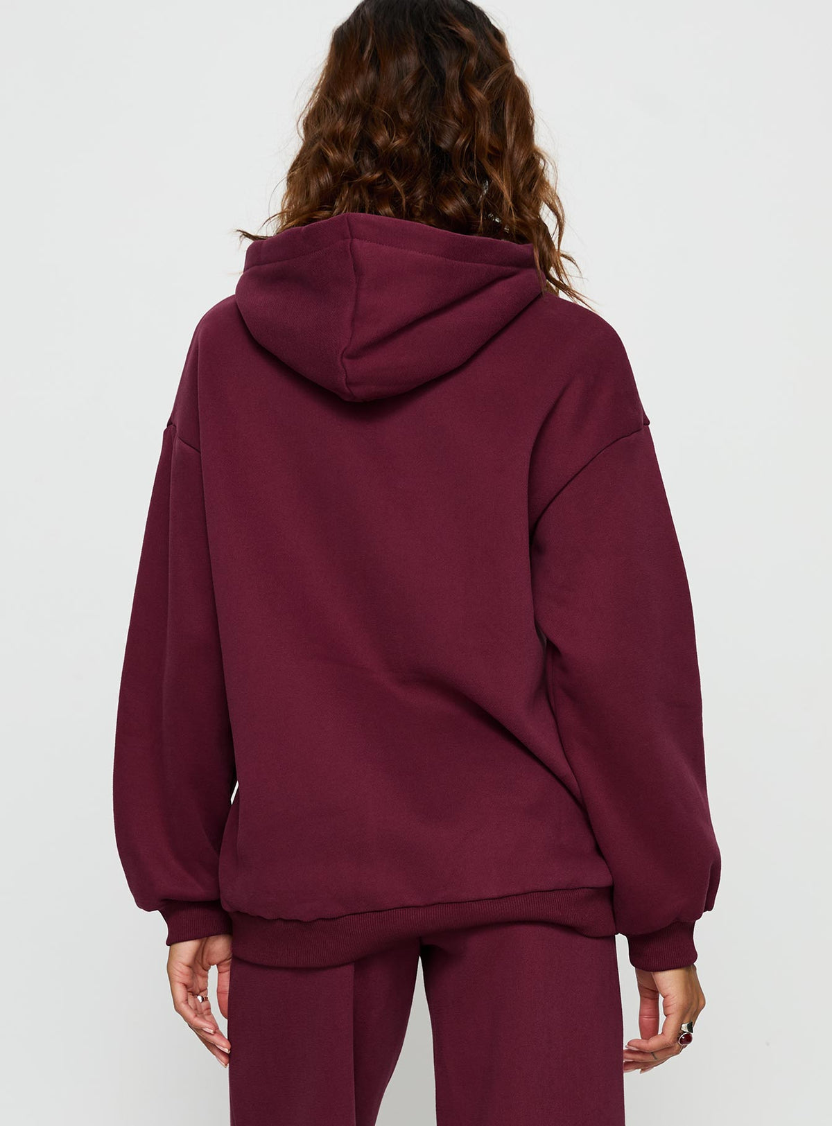 Designed with the Stargirl Zip Through Jumper in Burgundy womens jumpers long fit back view of model wearing Princess Polly