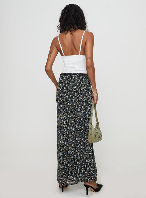back view of model wearing Princess Polly Emily Maxi Skirt Blue / Black Floral Maxi Skirts Skirts 