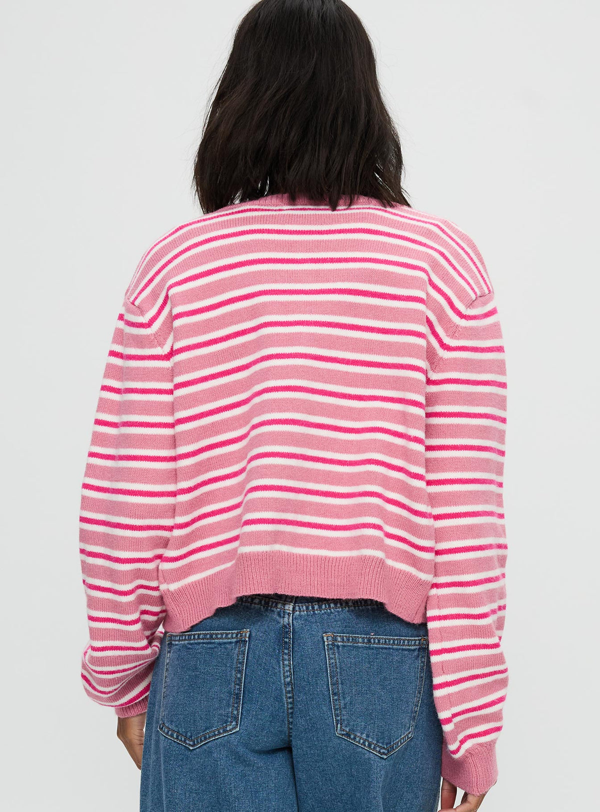 back view of model wearing Princess Polly Heavenly Dream Cardigan Pink Stripe Cropped Jumpers Jumpers 