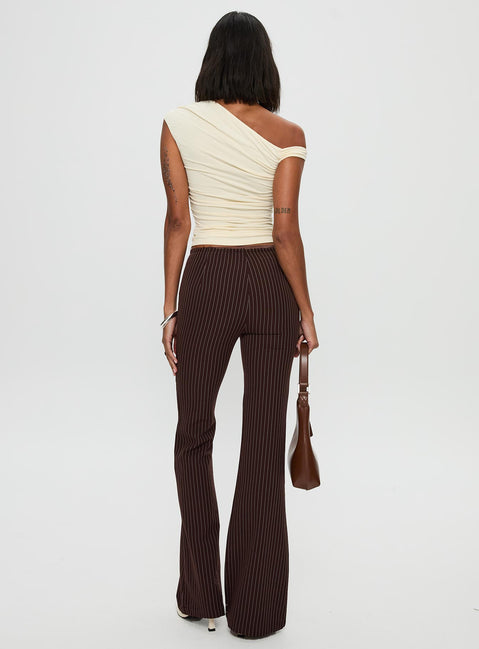 back view of model wearing Princess Polly Sportia Flare Pants Brown High Waisted Pants 
