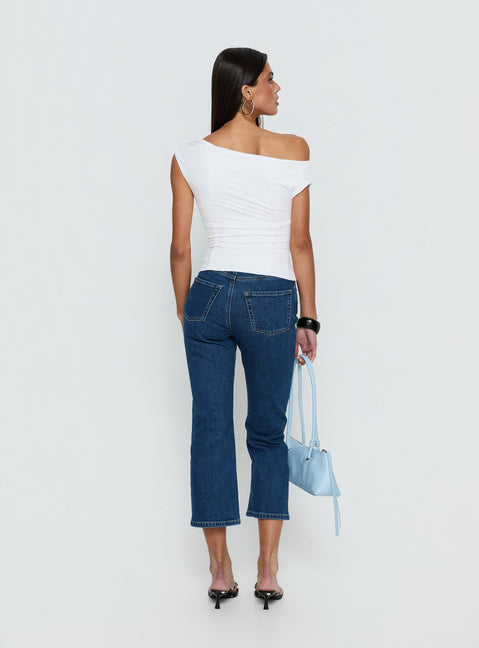 back view of model wearing Princess Polly Cindee High Rise Cropped Jeans Mid Blue Wash High Rise Jeans Jeans 
