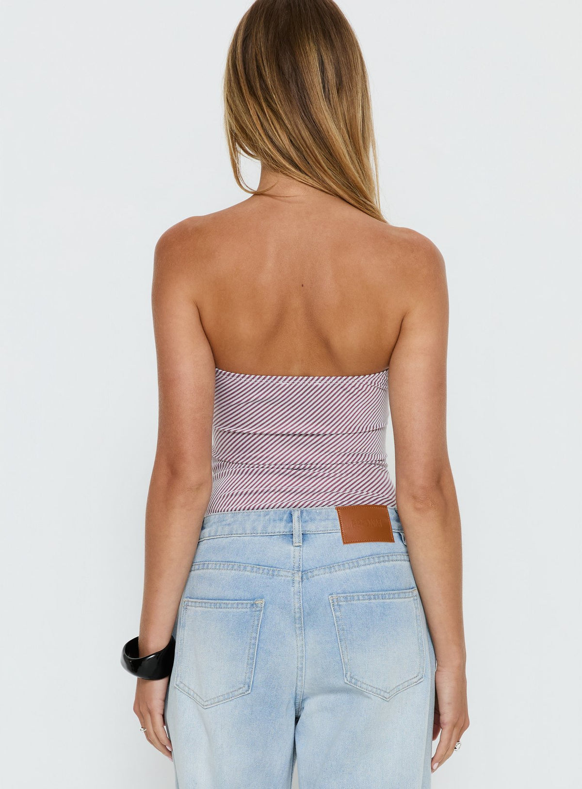 back view of model wearing Princess Polly Sunbathing Hardware Detail Bodysuit Pink Sleeveless Bodysuit 