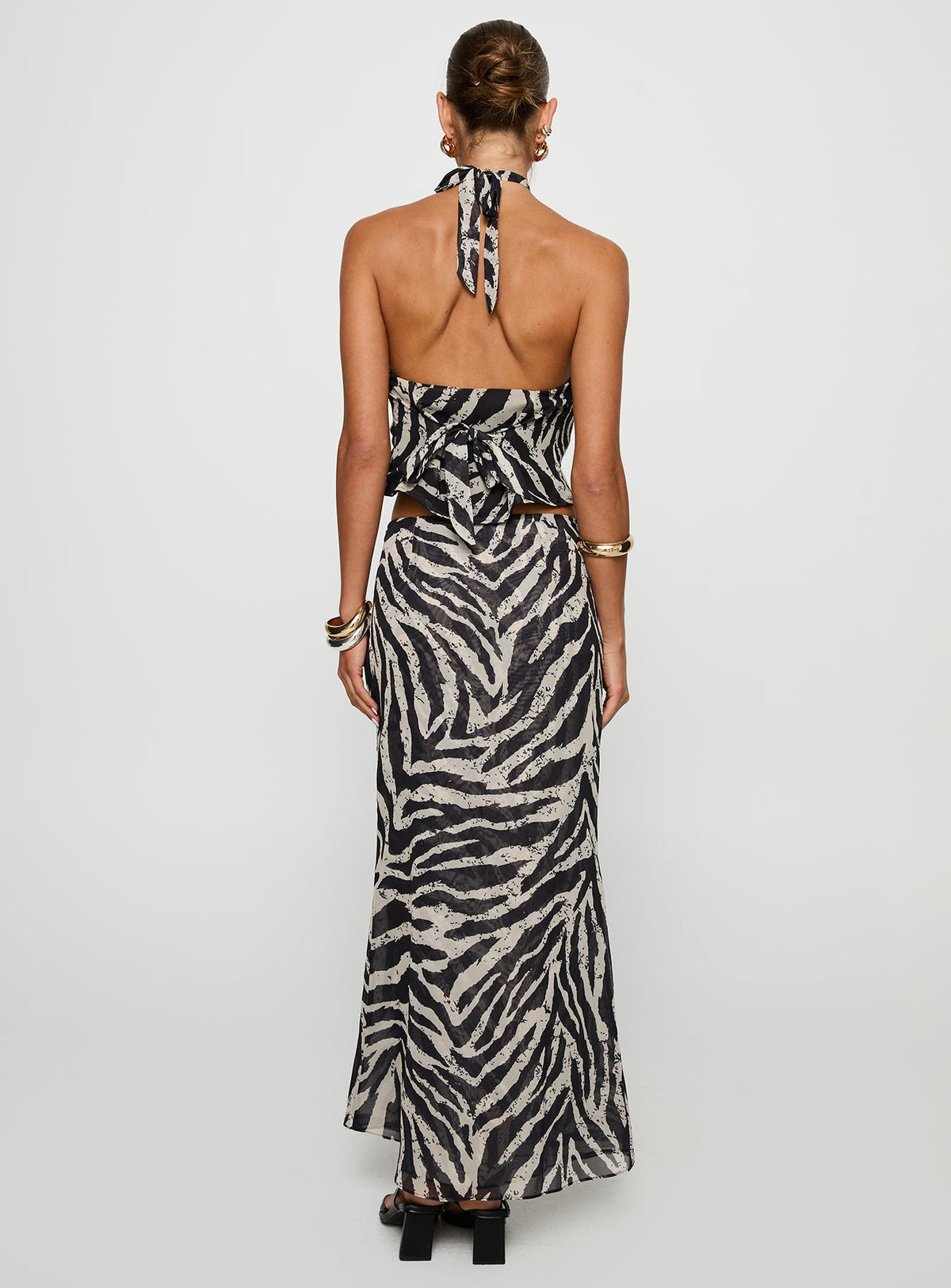 back view of model wearing Princess Polly Eleganza Maxi Skirt Zebra Maxi 
