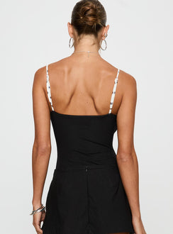 back view of model wearing Princess Polly Evette Bodysuit Black / White Sleeveless Bodysuit 