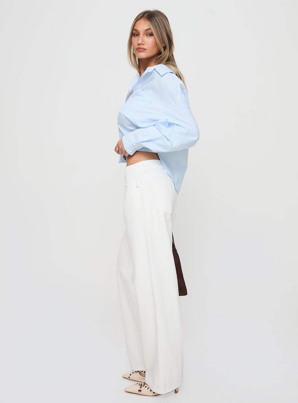 Designed with Ellanor Low Rise Straight Leg Jeans White Petite womens-jeans featuring a low-rise waist side view of model wearing Princess Polly