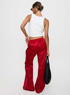 back view of model wearing Princess Polly Travalta Satin Track Pant Red Low Rise Pants Pants 