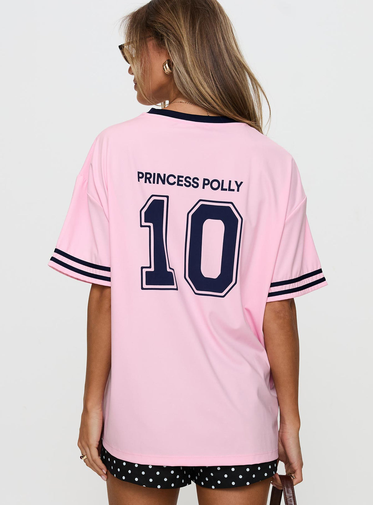 back view of model wearing Princess Polly Cornwall Football Jersey Pink Half Sleeves Crew Neck 